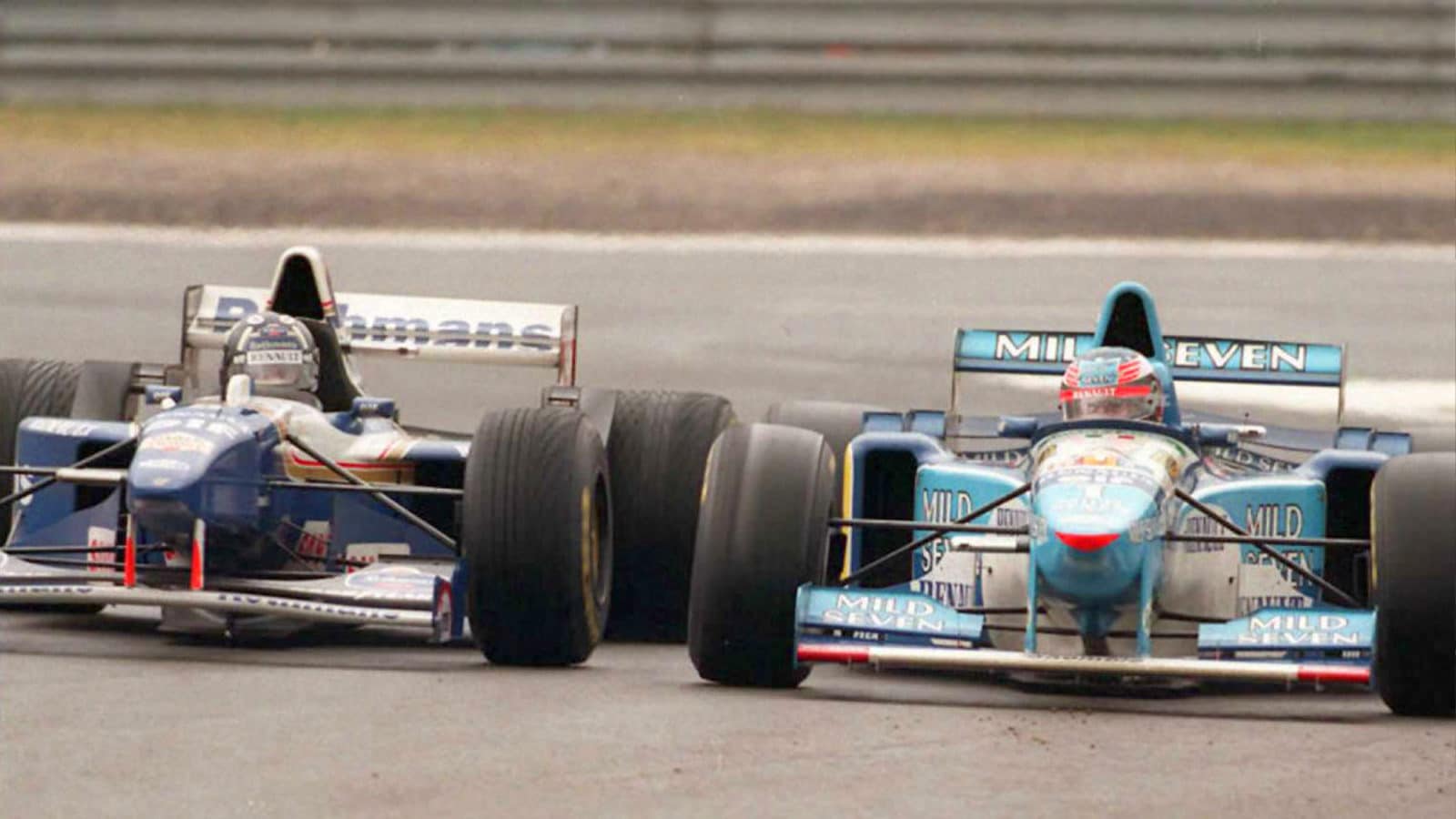 Damon Hill and Michael Schumacher side by side in the 1995 Belgian Grand Prix