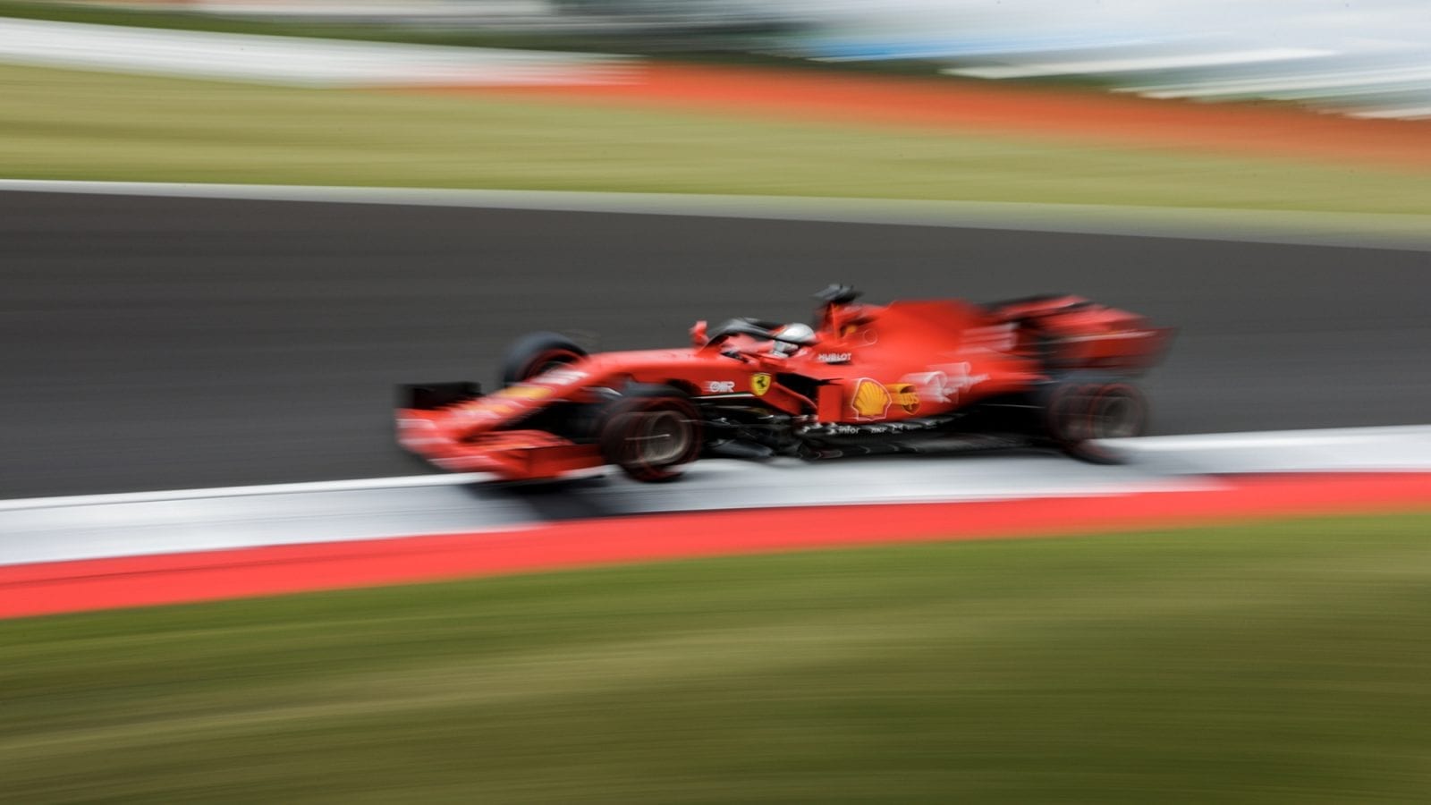 Blurred image of Sebastian Vettel’s Ferrari during the 2020 British Grand Prix at Silverstone