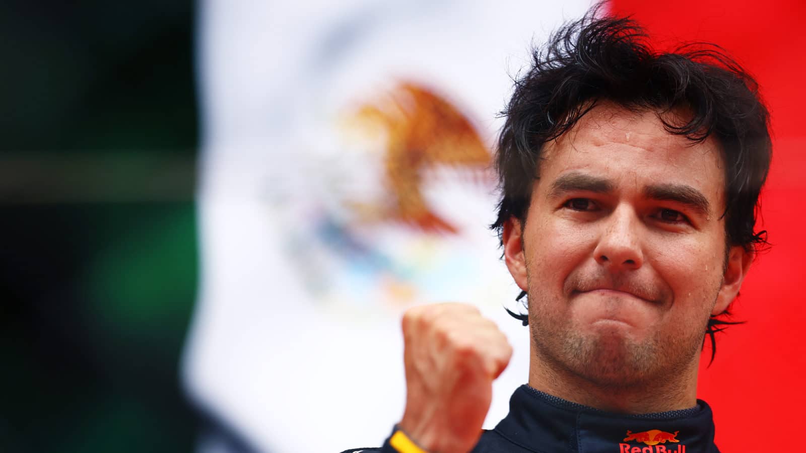 Carlos Sainz pumps his fist after winning the 2022 Monaco Grand Prix