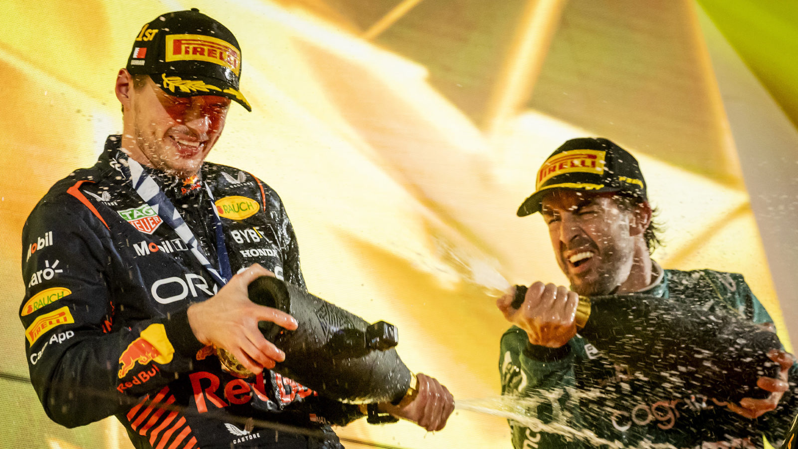 Fernando Alonso and Max Verstappen spray champagne on F1 podium at the 2023 Bahrain Grand Prix