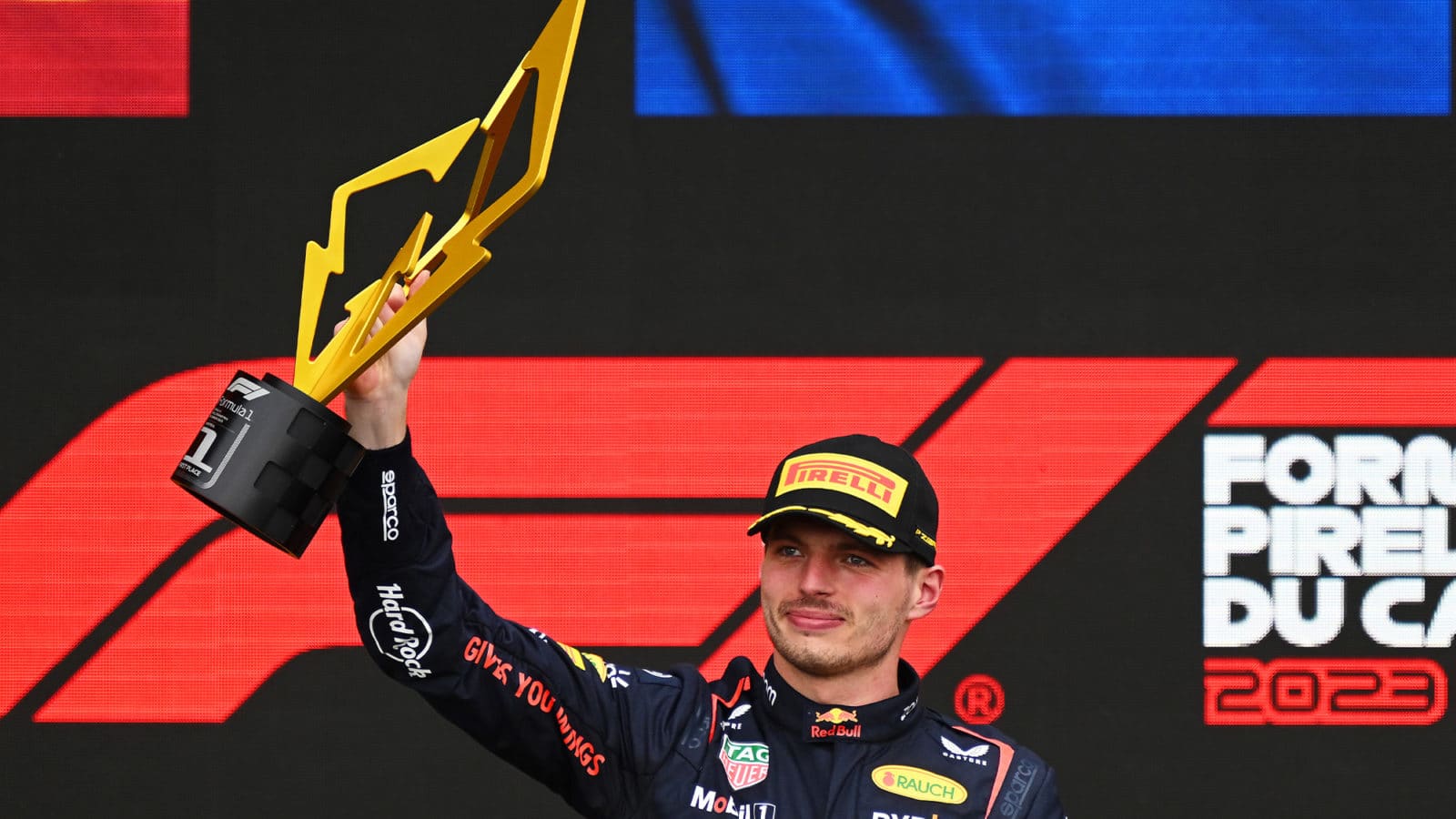 Max Versatppen holds winning trophy from 2023 Canadian Grand Prix