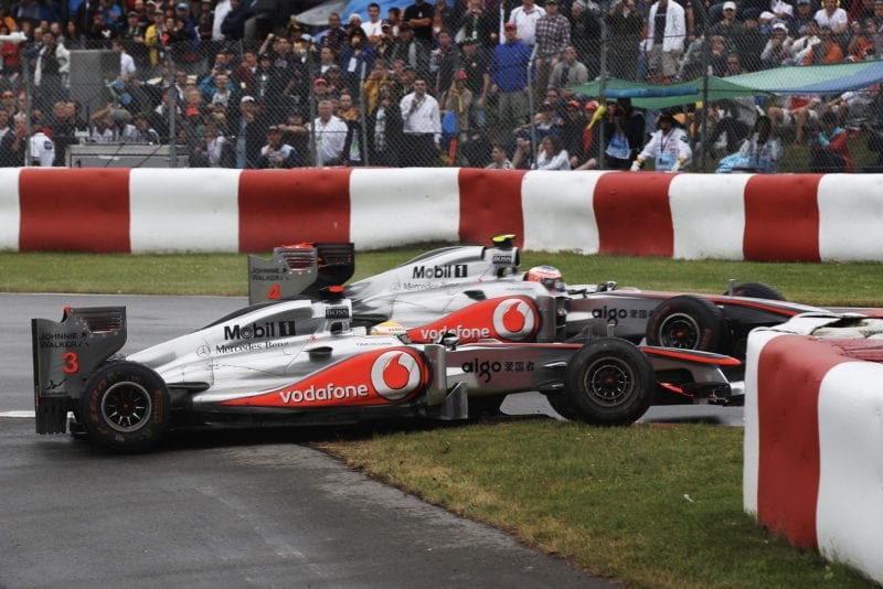 Jenson Button and Lewis Hamilton collide in the 2011 canadian grand prix