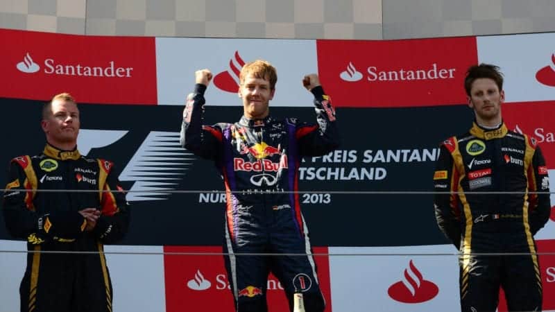Race winner Sebastian Vettel with Kimi Raikkonen and Romain Grosjean on the podium after the 2013 German Grand Prix at the Nürburgring