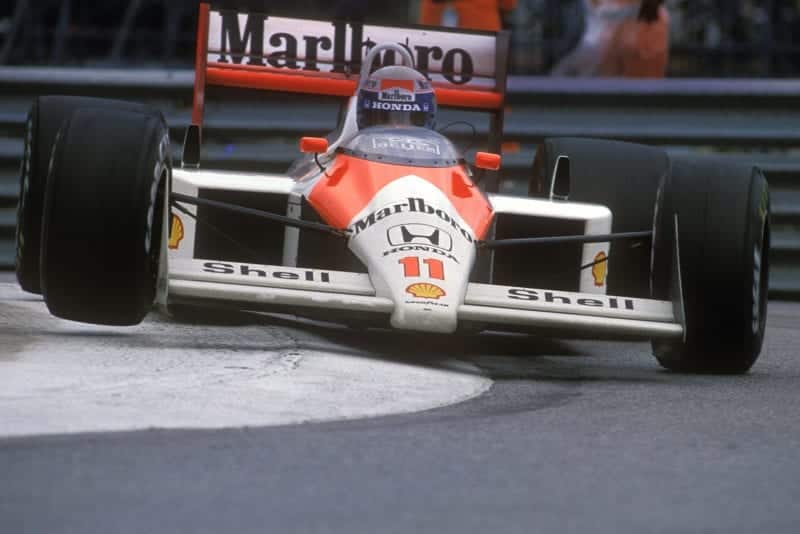 Alain Prost rides the kerbs in his McLaren Honda at the 1988 Monaco Grand Prix