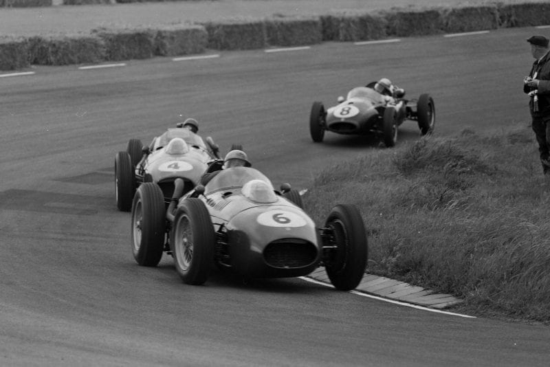 Luigi Musso in his Ferrari 246, leads Peter Collins also in a Ferrari 246, and Jack Brabham in his Cooper T45 Climax.
