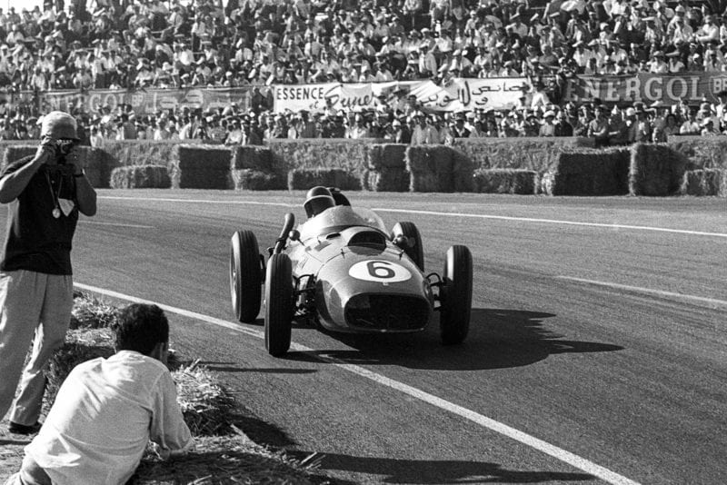 Mike Hawthorn, Ferrari 246, Grand Prix of Morocco, Ain-Diab Circuit, Casablanca, 19 October 1958. Mike Hawthorn on his way to second place in the 1958 Grand Prix of Morocco, the final race of the season, when he clinched the World Championship title. (Photo by Bernard Cahier/Getty Images)