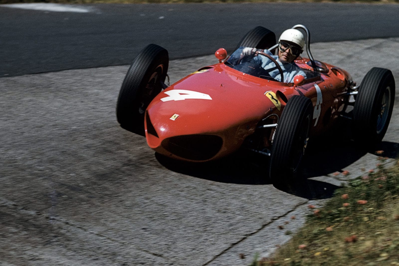 Phil Hill, Ferrari 156 Sharknose, Grand Prix of Germany, Nurburgring, 06 August 1961. Phil Hill driving his Ferrari 156 on the famous Karussell corner at the Nürburgring. (Photo by Bernard Cahier/Getty Images)