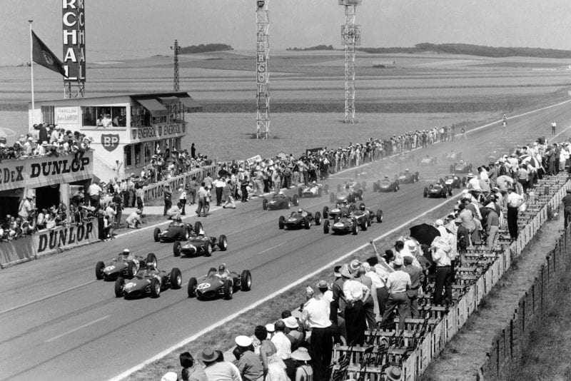 Wolfgang von Trips (#20) leads Phil Hill (#16), Richie Ginther (#18, all Ferrari 156) at the start of the race.
