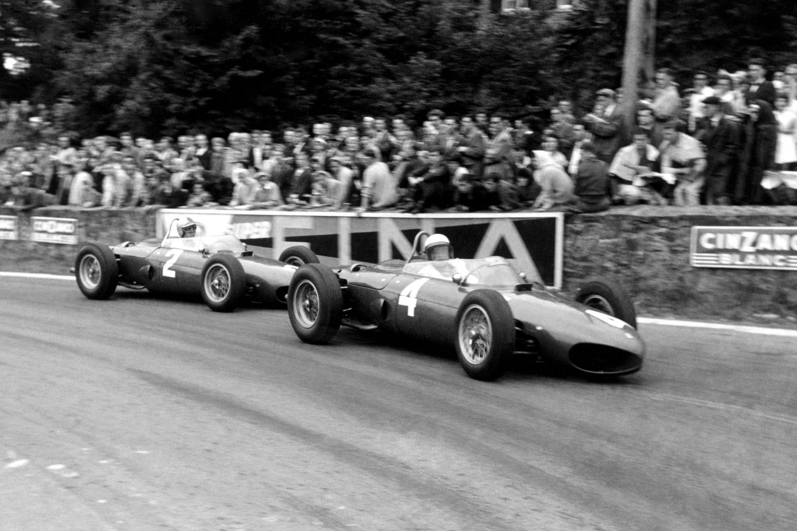 Phil Hill leads Wolfgang von Trips (Ferrari 156) into La Source Hairpin. They finished in 1st and 2nd respectively.