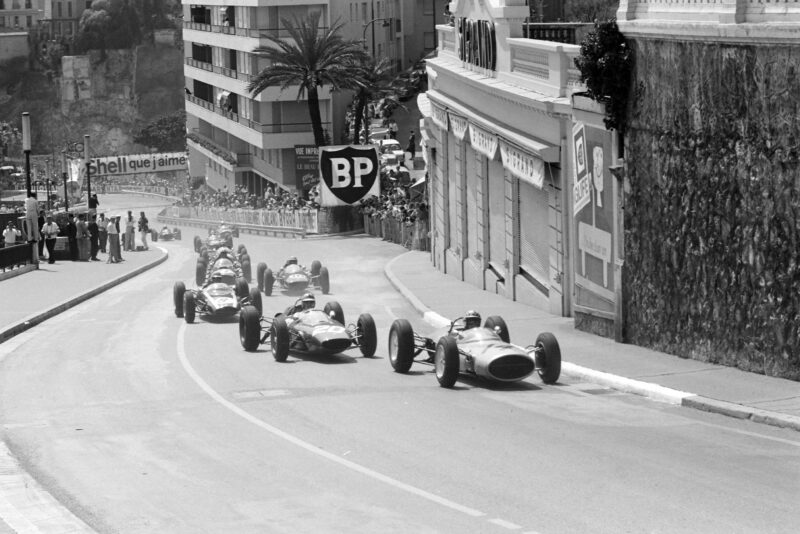 Innes Ireland, Lotus 24 BRM, leads Willy Mairesse, Ferrari 156/63,and Tony Maggs, Cooper T66 Climax, on the opening lap.