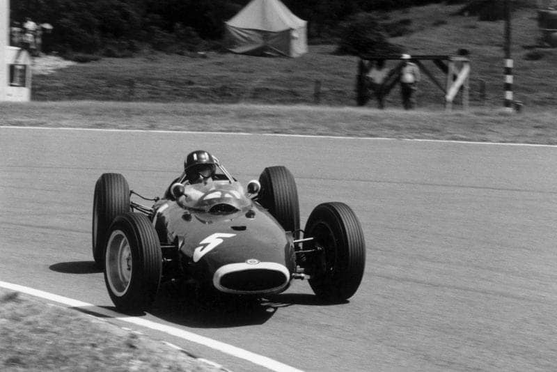 Graham Hill (BRM P57), goes sideways for photographer Michael Tee