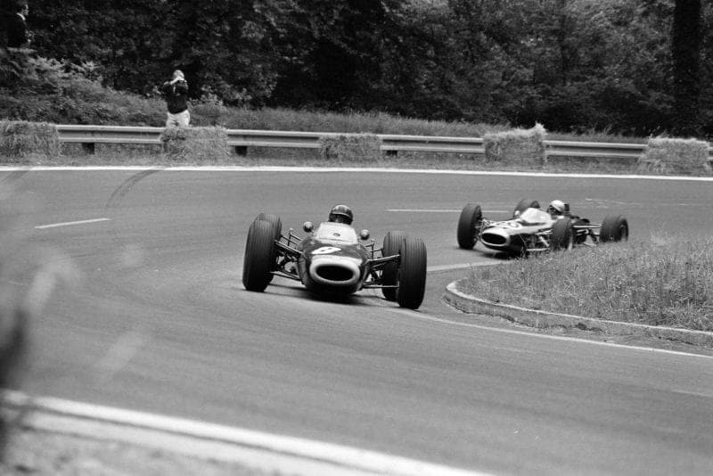 Graham Hill, BRM P261, leads Jack Brabham, Brabham BT7 Climax.