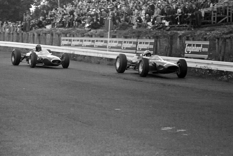 John Surtees, Ferrari 158, leads Dan Gurney, Brabham BT7 Climax.