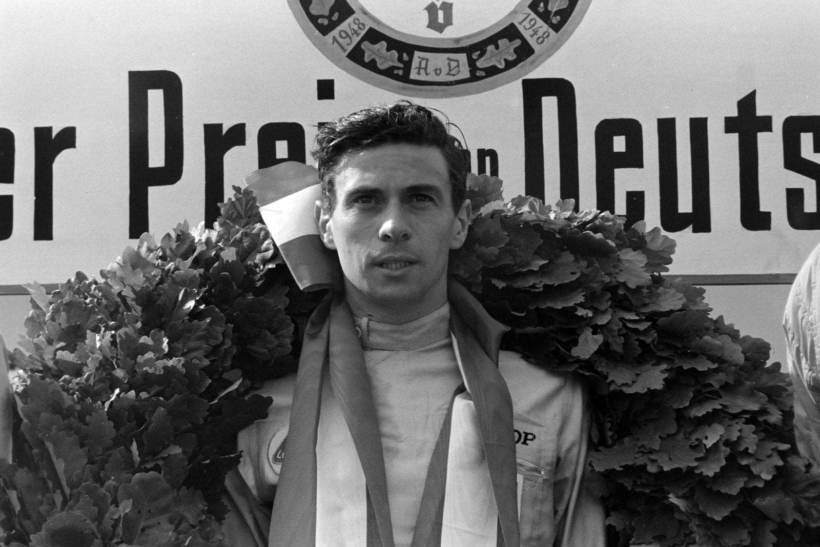 Jim Clark, 1st position, on the podium.