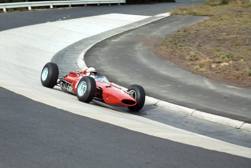 John Surtees (Ferrari 1512) in the Karussel.