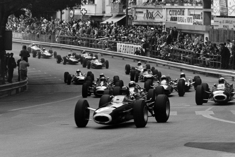 Graham Hill, BRM P261, leads the field away at the start.