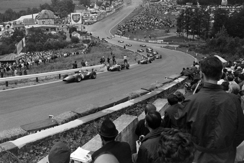 Surtees heads the field up into Eau Rouge.