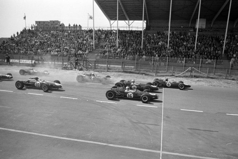Jim Clark, Lotus 33 Climax leads Denny Hulme, Brabham BT20 Repco and Jack Brabham, Brabham BT19 Repco at the start of the race.