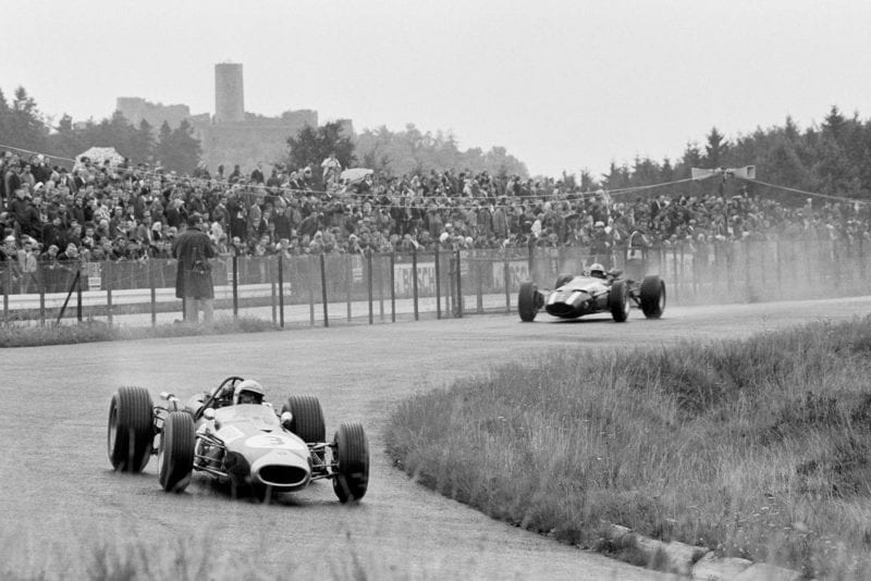 Jack Brabham (AUS) Brabham BT19 leads second placed John Surtees (GBR) Cooper T81 en route to his fourth successive Grand Prix victory.