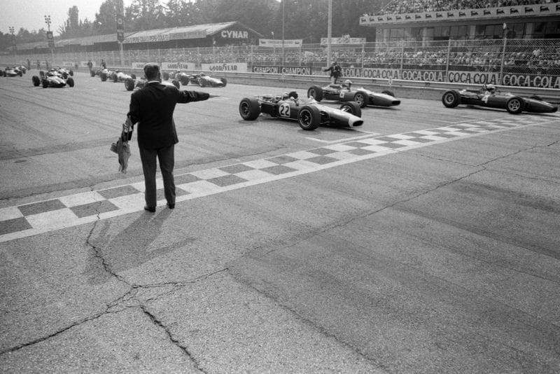 Pole sitter Mike Parkes, Ferrari 312 sits on the front row alongside Jim Clark, Lotus 43 BRM.