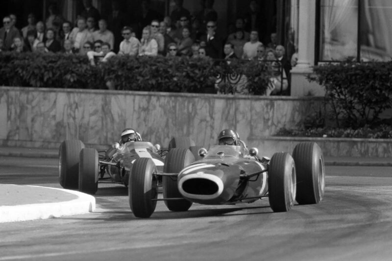 Graham Hill, BRM P261, leads Jim Clark, Lotus 33 Climax.