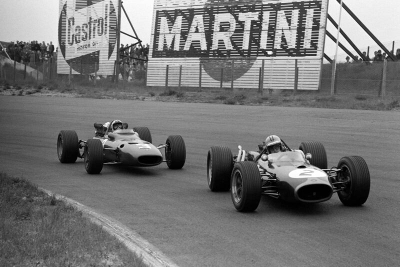 Denny Hulme, Brabham BT20 Repco, leads Chris Amon, Ferrari 312.