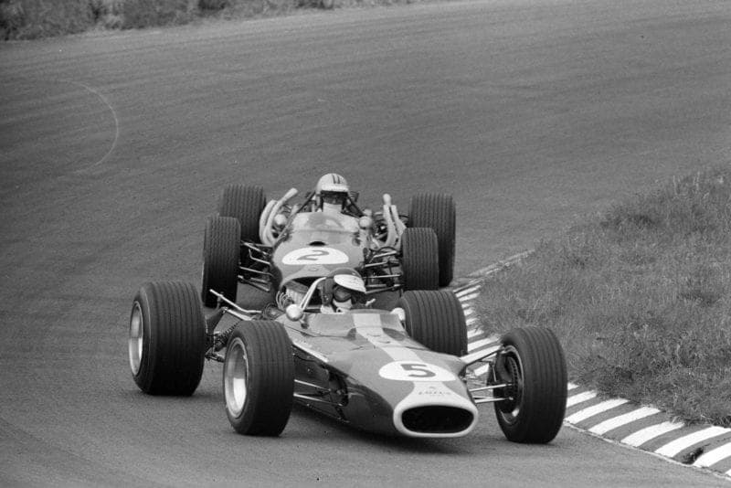 Jim Clark, Lotus 49 Ford leads Denny Hulme, Brabham BT20 Repco.