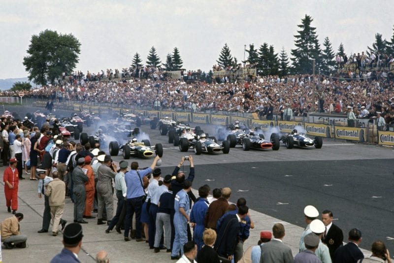 1967 German Grand Prix.Nurburgring, Germany. 6 August 1967.Jim Clark (Lotus 49-Ford Cosworth), Denny Hulme (Brabham BT24-Repco), Jackie Stewart (BRM P83) and Dan Gurney (Eagle T1G-Weslake) on the front row.