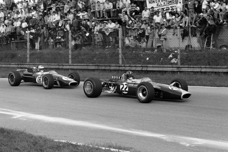 Graham Hill, Lotus 49 Ford, leads Denny Hulme, Brabham BT24 Repco.