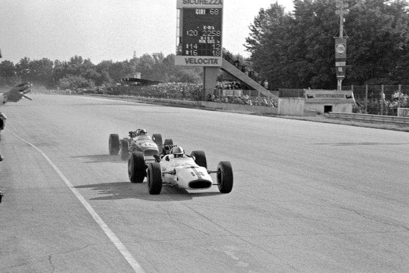John Surtees, Honda RA300, leads Jack Brabham, Brabham BT24 Repco.