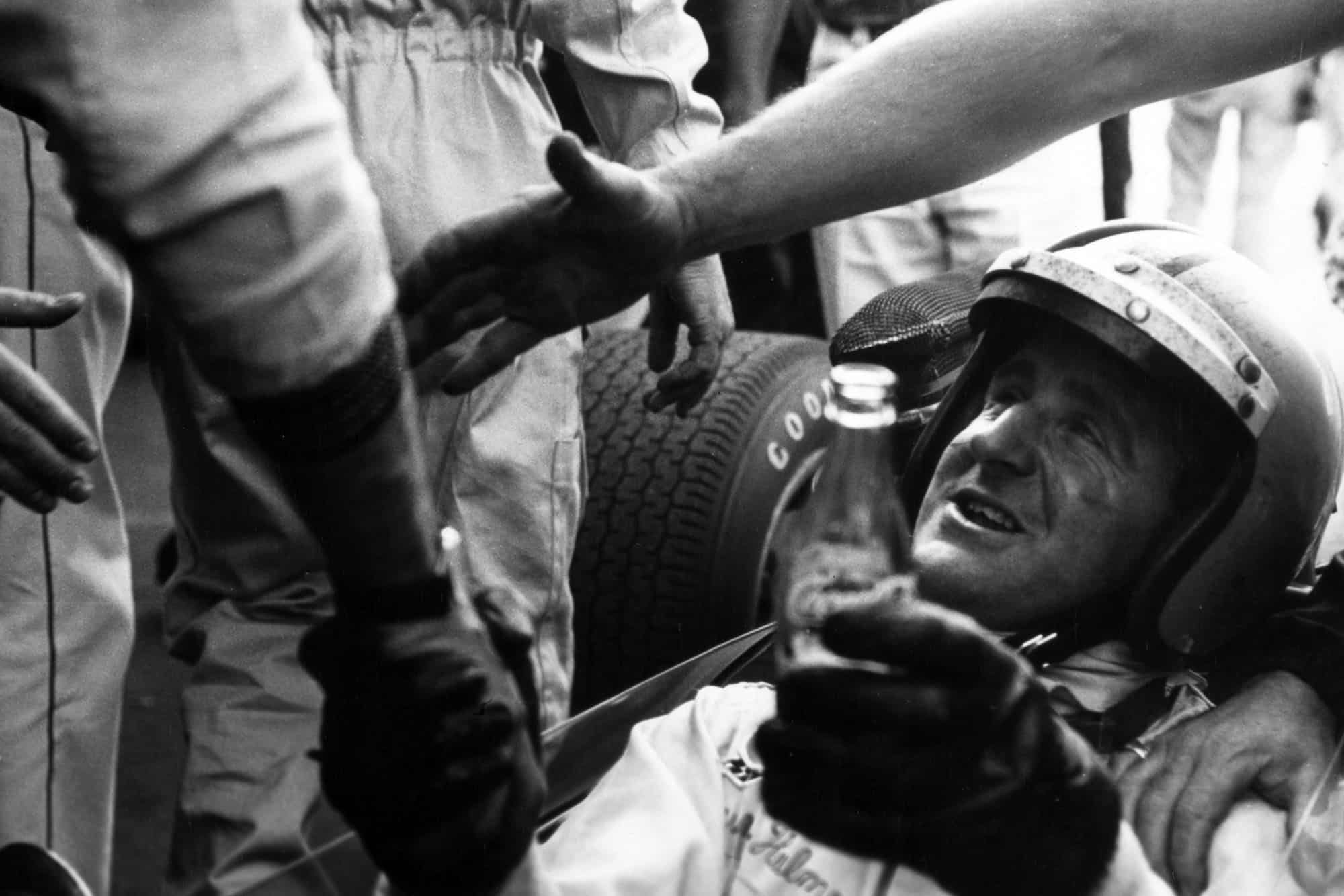 Denny Hulme, Brabham BT24-Repco, 3rd position, after clinching the world championship, portrait, helmet.