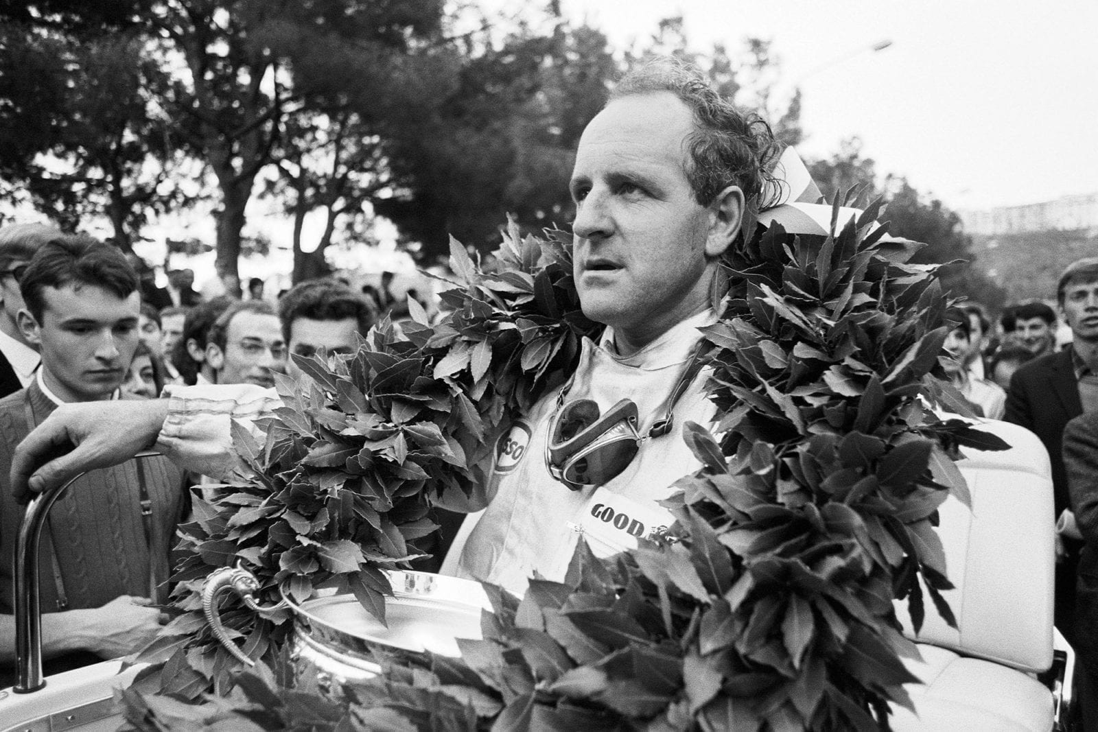 Denny Hulme with the Monaco GP winner's wreath and trophy.