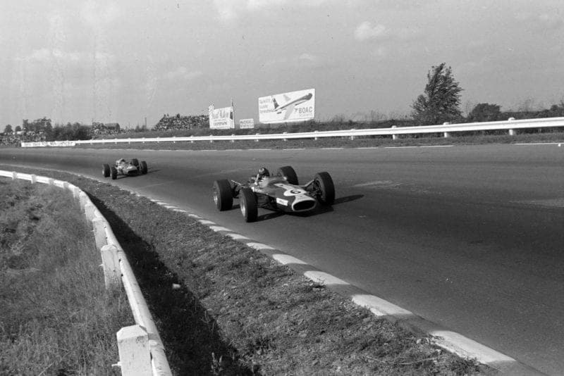 Graham Hill, Lotus 49 Ford, leads Chris Amon, Ferrari 312.