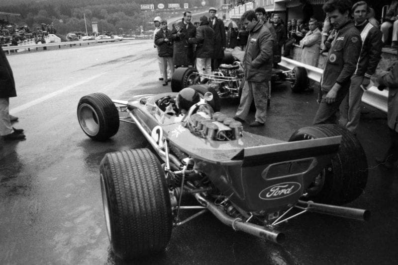 Jackie Oliver, Lotus 49B Ford, in the pit lane.
