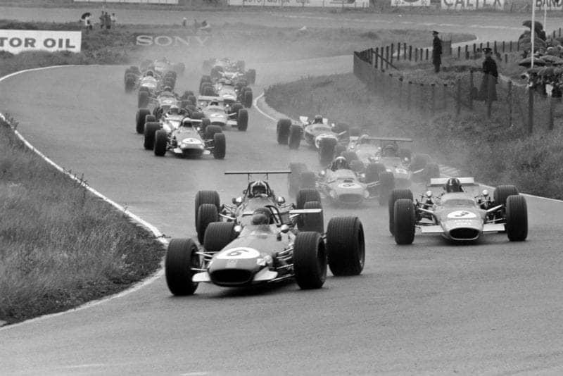 Jochen Rindt, Brabham BT26 Repco, leads Chris Amon, Ferrari 312, and Graham Hill, Lotus 49B Ford, at the start.