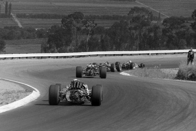 Jackie Stewart, Matra MS9 Ford, leads Jim Clark, Lotus 49 Ford, and Jochen Rindt, Brabham BT24 Repco, at the start.