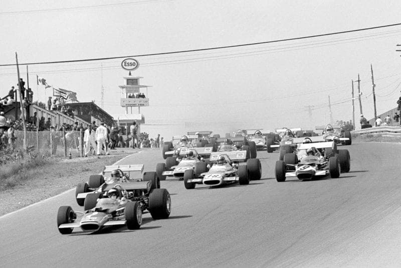Cars head down the hill at the start of the 1969 Canadian Grand Prix