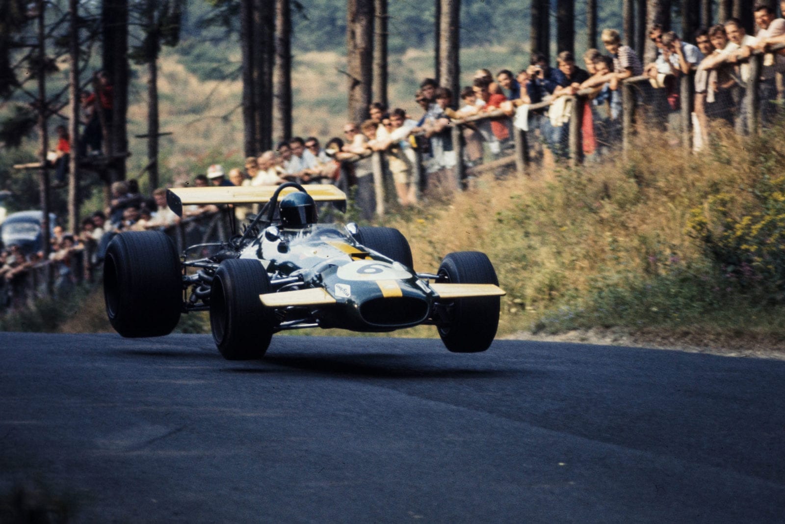 Jacky Ickx's car takes off as he goes through the flugplatz