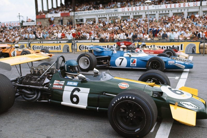 Jacky Ickx (Brabham) lines up next to Jackie Stewart in his Matra.
