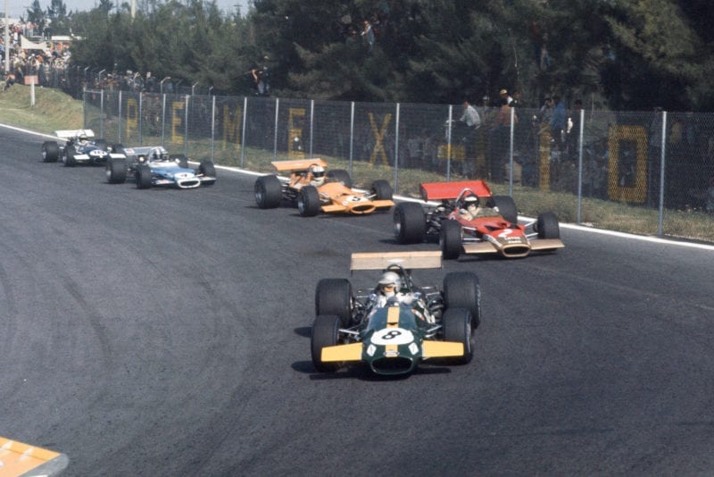 Jack brabham leads the field at the start of the 1969 Mexican Grand Prix.