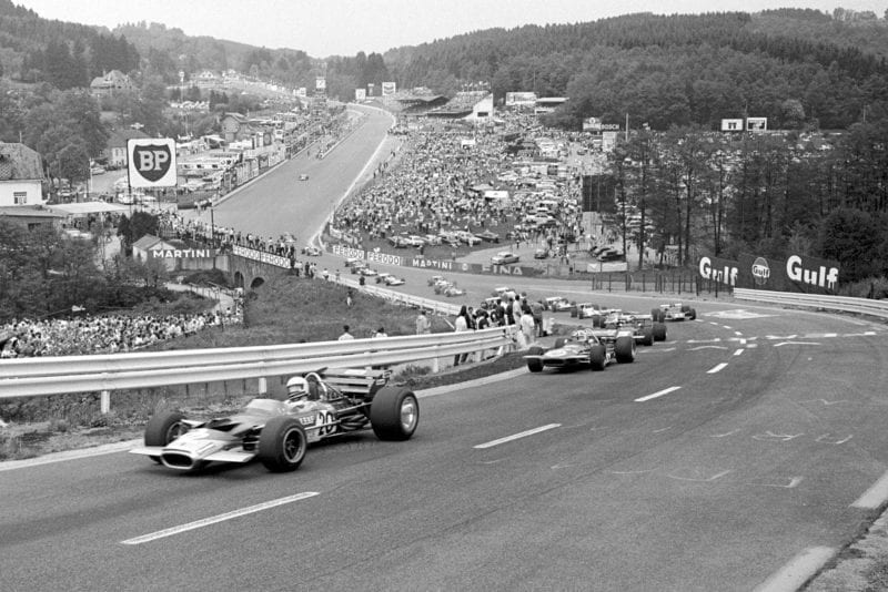 The pack make its way up Eau Rouge and Raidillon at the 1970 Belgian Grand Prix