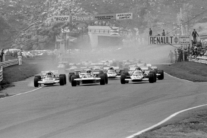 The cars pull away from the grid at the 1970 Canadian Grand Prix