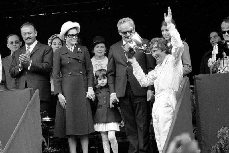 Jochen Rindt celebrates his surprise victory with Pricne Rainier and Princess Grace
