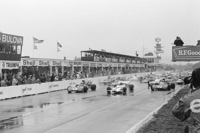 Cars tentatively pull away as the 1971 Canadian Grand Prix starts in treacherous conditions