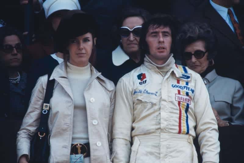 Jackie Stewart stands on the podium with his wife Helen after winning the 1971 Spanish Grand Prix