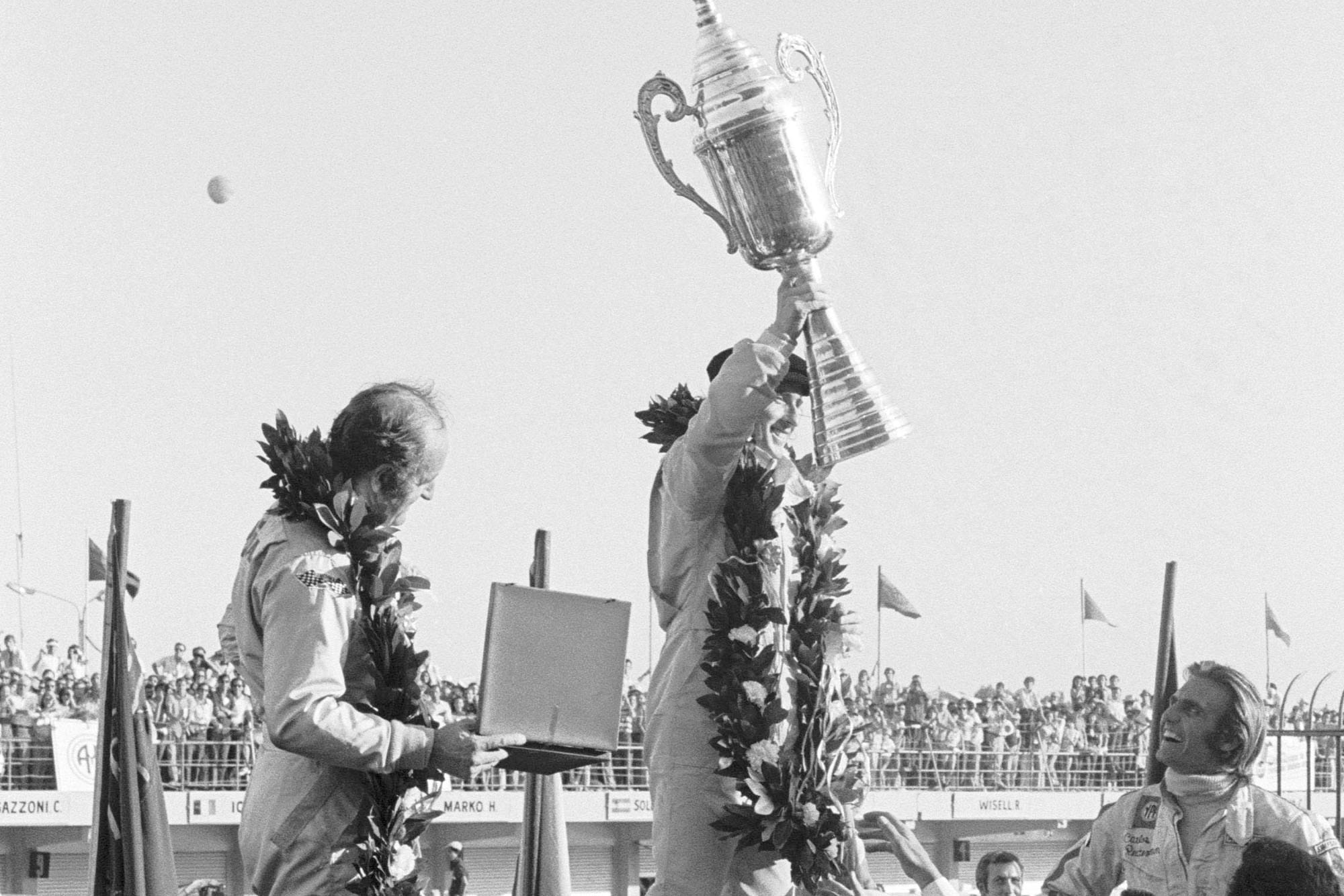 Tyrrell's Jackie Stewart celebrates winning the 1972 Argentine Grand Prix.
