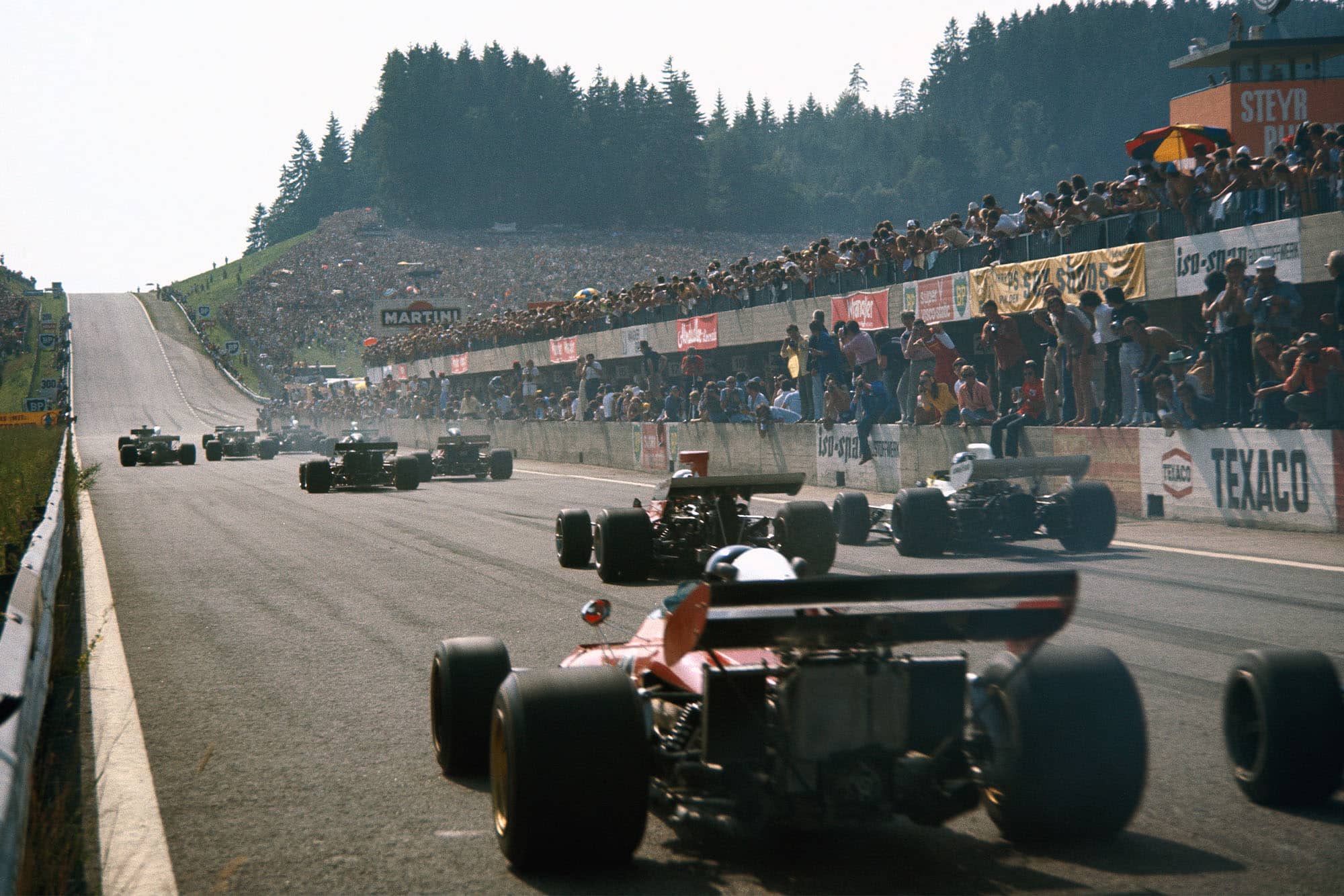 Cars set off up the hill at the start of the 1972 Austrian Grand Prix.