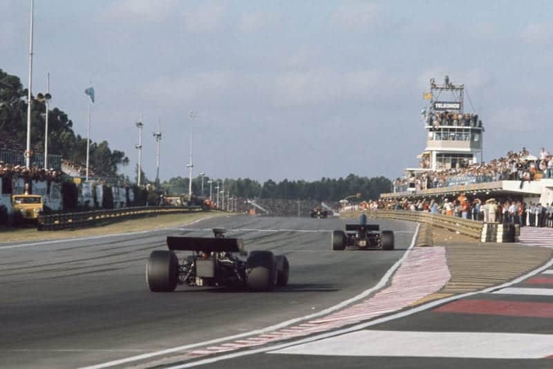 Fittipaldi chases down Cevert.