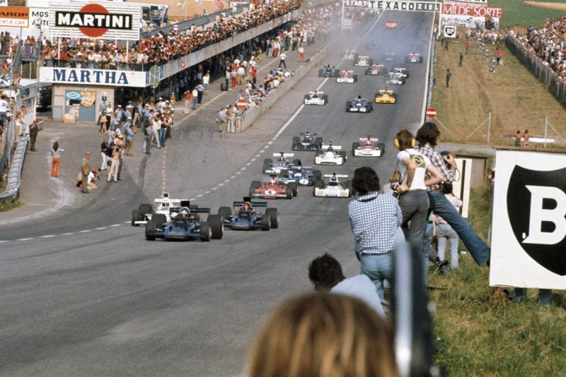Emerson Fittipaldi takes the lead at the 1973 Austrian Grand Prix start.