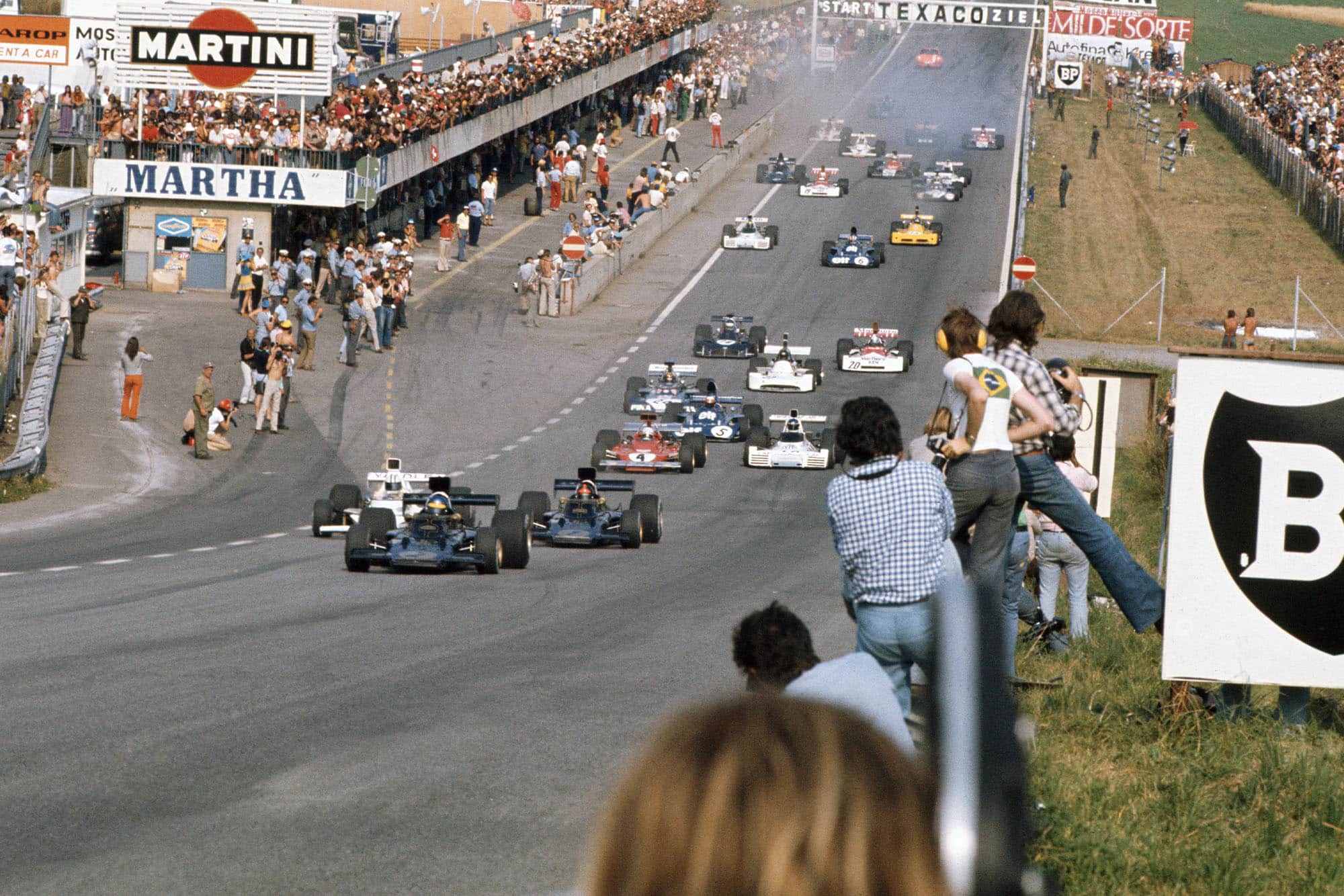 Emerson Fittipaldi takes the lead at the 1973 Austrian Grand Prix start.